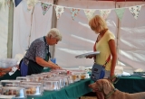THE WI SERVE ALL COMERS IN THE TEA TENT AT BRIGHSTONE SUMMER SHOW
